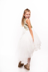 Young girl in the Studio on a white background.The girl shows emotions