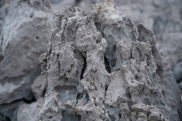 Close-up rock formation with cracks background texture