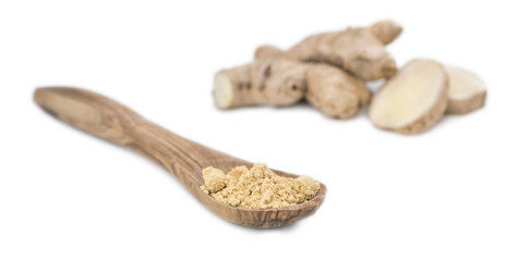 Some Powdered Ginger isolated on white (selective focus)
