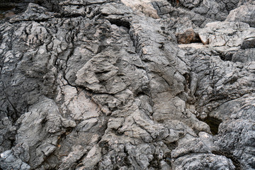 Close-up rock formation with cracks, backgrounds texture