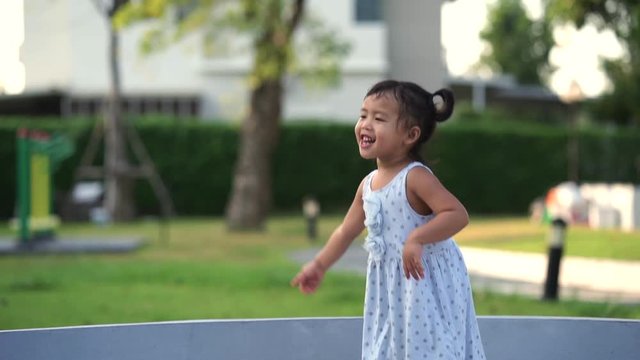 Cute girl playing in park 