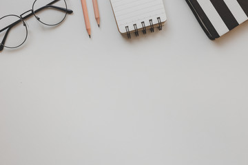 flat lay mockup image.office equipment on desk table.blank background empty space for text design studio creativity ideas for study,education,business modern accessories at workplace.blogging,blog 