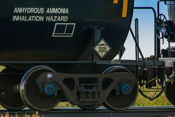 Close up of the tank car of a canadian freight train with 1005 warning sign. Sign indicates...