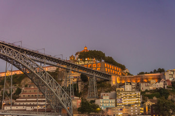 Oporto, Portugal - Dom Luis iron bridge with Gaia city skyline