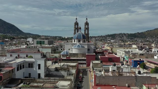 Tepic Cathedral in city centre of Tepic. State Nayarit in Mexico. Aerial drone view of Tepic. Flying forward.