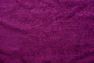 Purple fabric texture, solid fabric background from crumpled fabric.
