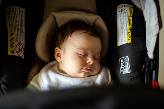 Sleeping Baby Boy In Car Seat