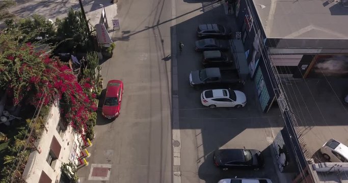 4k drone aerial downtown los angeles with traffic, bikes, skyline, city hall, police building