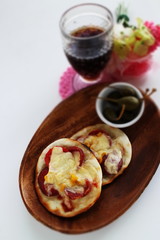 Fusion food, gyoza dough and tomato cheese bake for pizza style
