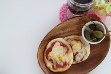 Fusion food, gyoza dough and tomato cheese bake for pizza style