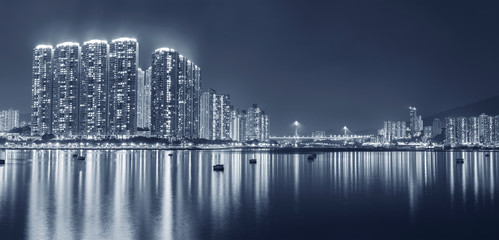 Obraz premium Panorama of harbor of Hong Kong city at night