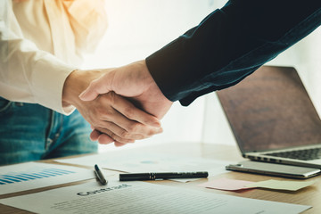 handshake business partners agree to contract Real Estate Venture International trade,contract investment in meetings vision to invest for profit. - obrazy, fototapety, plakaty