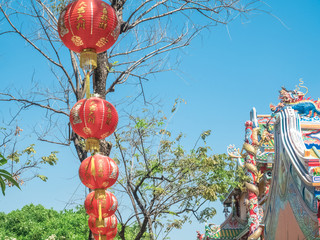 Sky blue Close to the Chinese New Year Asian cultural descent churches and temple Including red lanterns to decorate with Chinese write meaning good luck wealth money throughout the year as a greeting