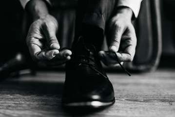 Dressing in dark shoes for the groom. black and white