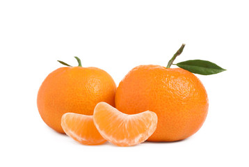 Fresh ripe tangerines with leaf isolated on white. Citrus fruit
