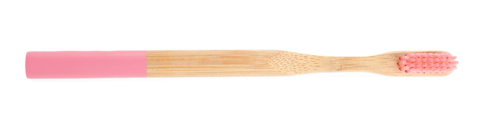 Bamboo toothbrush with pink bristle isolated on white, top view