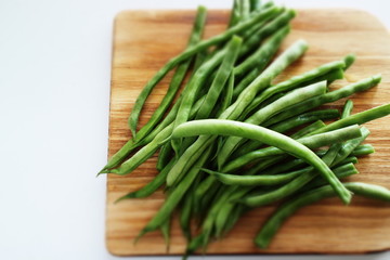 freshness green bean on wooden chopping board