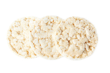Crunchy rice cakes isolated on white, top view