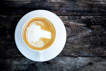 Coffee cup on wooden.