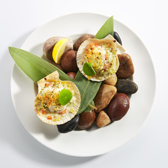 Baked Scallop in Scallops Shell with Spices Isolated