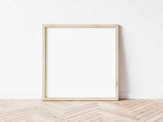 Square wood frame mockup. Wooden frame on wooden floor. Square frame 3d illustrations.