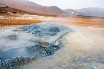 Bubbling geothermal hot/mud pool in the Hverarond area near Myvatn in the Icelandic landscape....