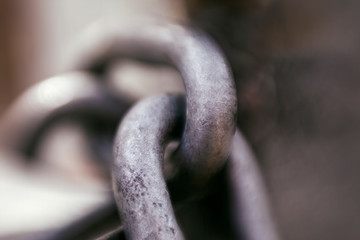Metal chain links with bokeh background 