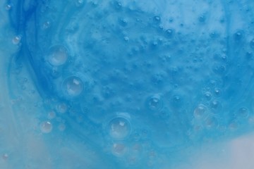 blue soap  macro background.soap bubbles blue  color . Detergent texture. Shower gel. Purity and freshness. Bath foam. Ease.Lightness and airiness	