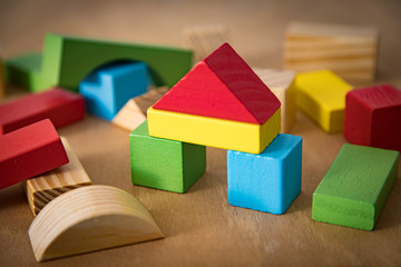 Colorful wooden block for kids. Toddler toys. Building learning concept
