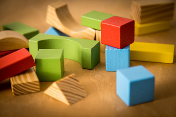 Colorful wooden block for kids. Toddler toys. Building learning concept