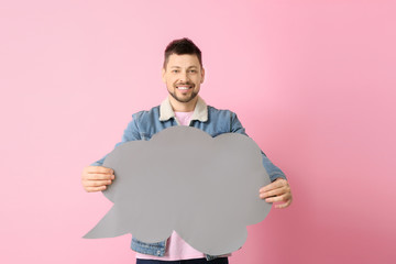 Man with blank speech bubble on color background