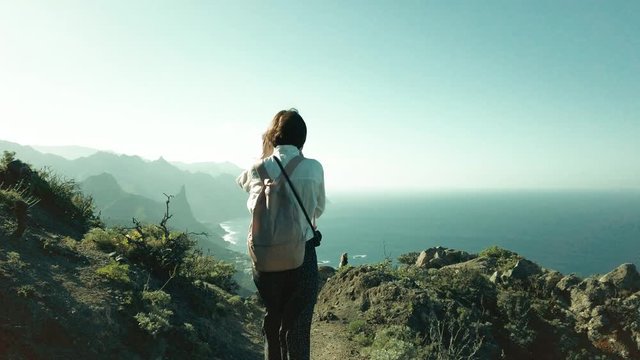 Girl hiking over trail in Anaga mountains in Tenerife