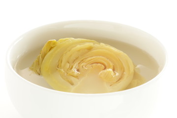Chinese food, pickled mustard vegetable on dish 