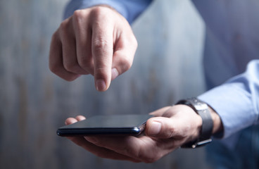 Man using smartphone. Technology concept