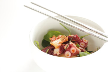 Japanese food, boiled octopus and baby leaf vegetable salad