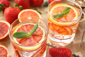 Red orange punch home made cocktail closeup