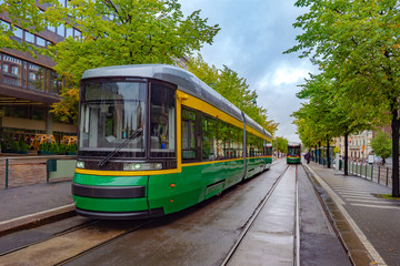 Helsinki. Finland. Tram on the city streets. Modern tram on the street of Helsinki. Public...