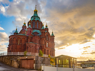 Fototapeta na wymiar Helsinki. Finland. Assumption Cathedral on a summer day. Orthodox cathedrals of Finland. Tours in the center of Helsinki. Dawn in Helsinki. Scandinavia. Vacations in northern Europe. Tours to Finland