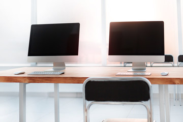 close up. computers on the table in the lobby of the business center.