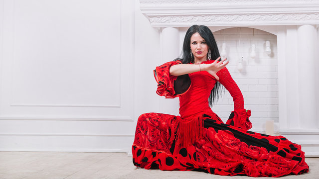 woman dancer in red dress performing Gypsy dance