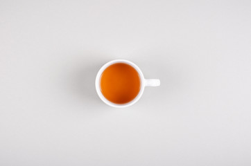 Obraz na płótnie Canvas Tea cup composition on gray background. Flat lay.