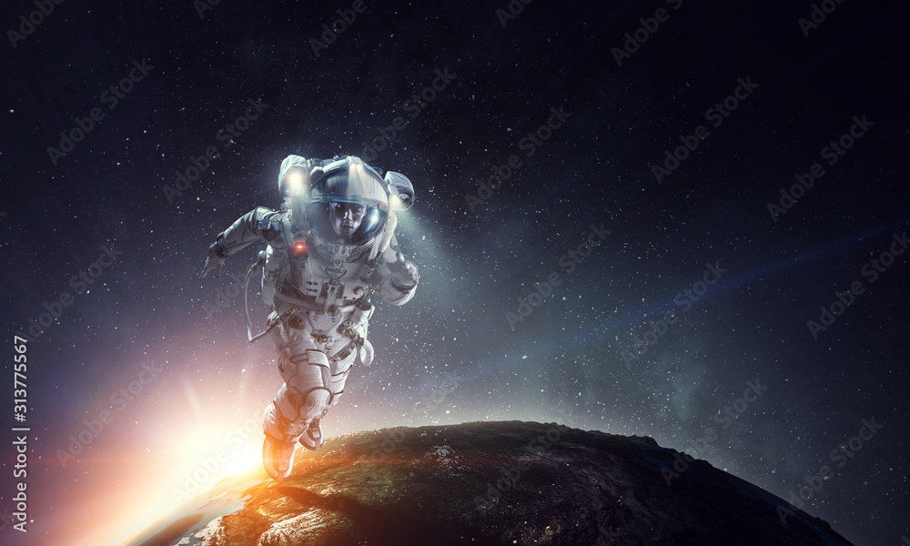 Wall mural exploring outer space. mixed media