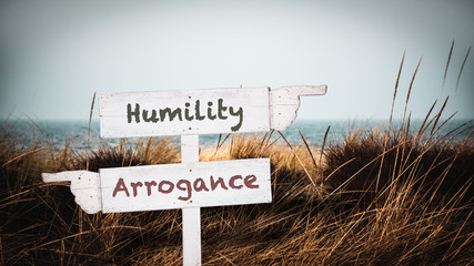 Street Sign to Humility versus Arrogance
