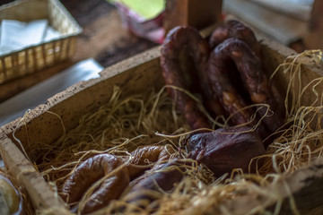 Detailed view of a homemade pork chorizos on wooden table
