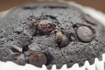 Homemade chocolate chip cup cake over white plate