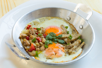Egg pan on wood