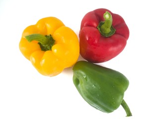 Obraz na płótnie Canvas Bell peppers green red red yellow white background
