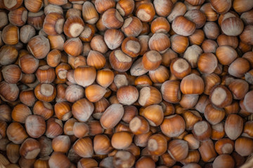 Nuts are on the counter in the store.