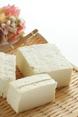 Cut tofu on bamboo basket with copy space