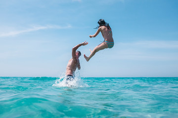 Couple having fun in the sea